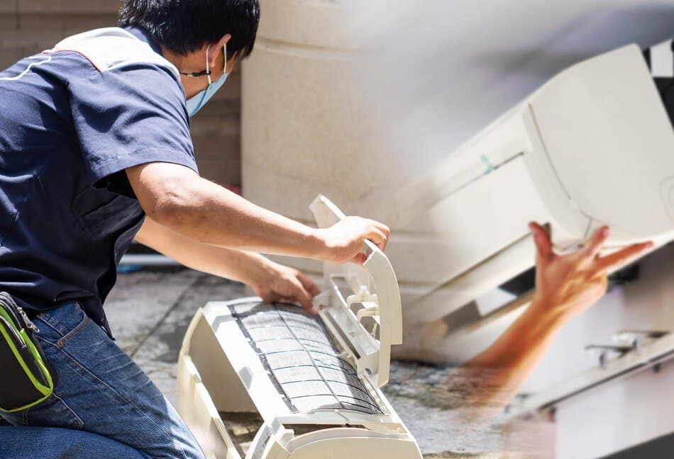 Technician Doing Regular Aircon Servicing