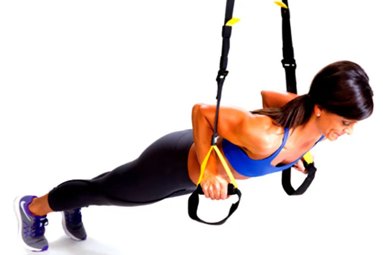 girl doing trx pushups