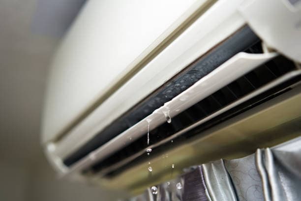 aircon is leaking water because of choked drainage pipe