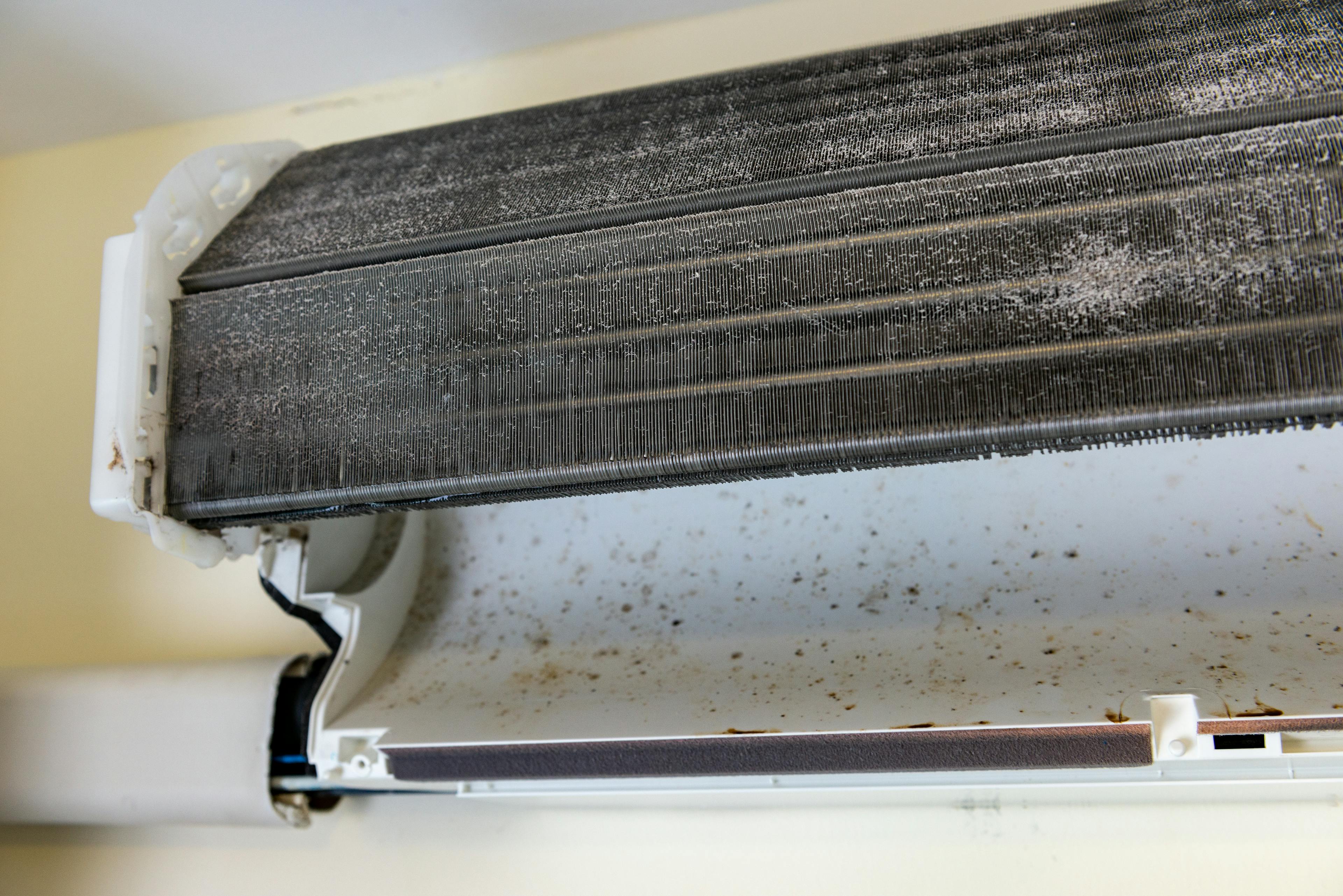 dirty aircon evaporator coil causing water leakage