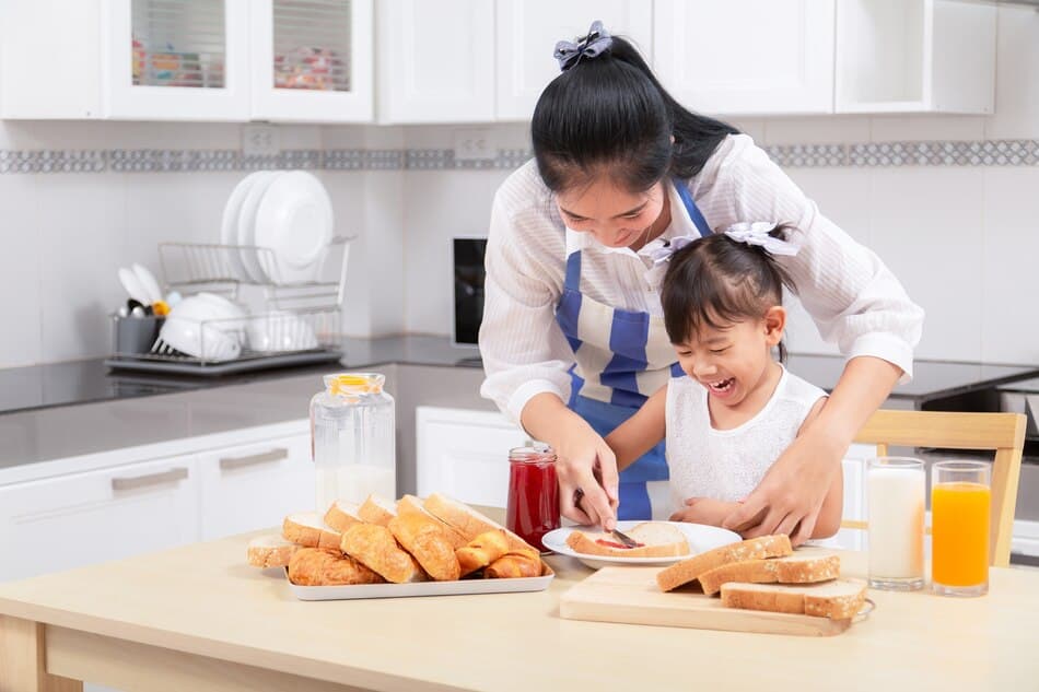 Babysitter helping with breakfast - StringsSG